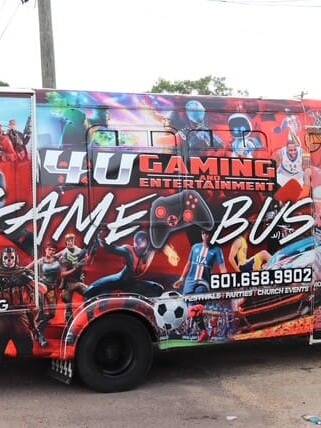 He bought a bus and began transforming it — installing multiple gaming systems, HDTVs, sound systems, and comfortable seating to create the ultimate mobile gaming experience.
