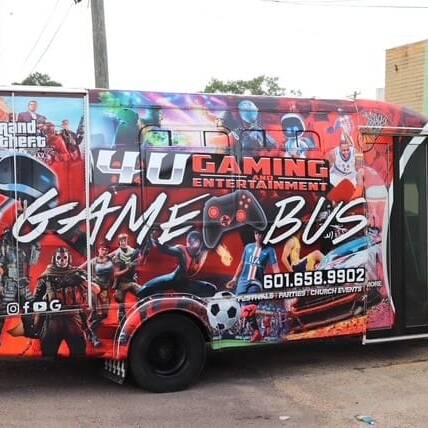 He bought a bus and began transforming it — installing multiple gaming systems, HDTVs, sound systems, and comfortable seating to create the ultimate mobile gaming experience.