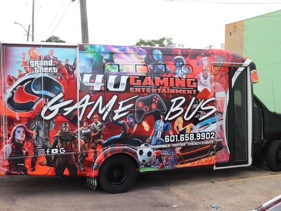 He bought a bus and began transforming it — installing multiple gaming systems, HDTVs, sound systems, and comfortable seating to create the ultimate mobile gaming experience.